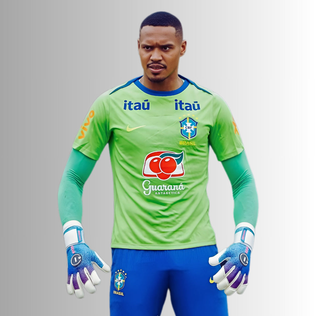 Professional goalkeeper John Victor wearing N1 Zeus 2.0 Snow gloves with UGT+ II German Latex for elite match performance.