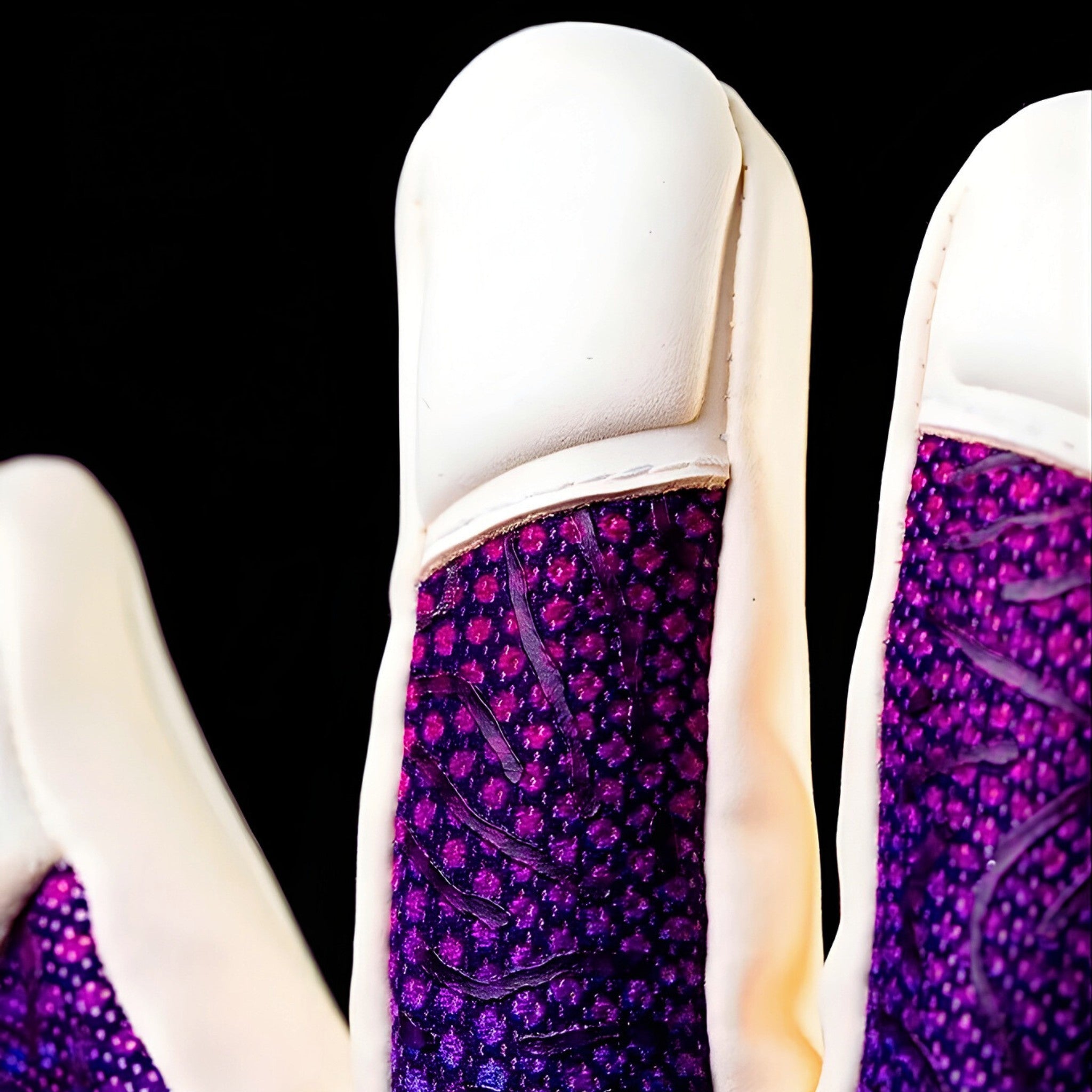 Close-up of N1 Zeus 2.0 Galaxy finger detailing the snug Vapor Negative Cut and professional stitching for a second-skin fit.